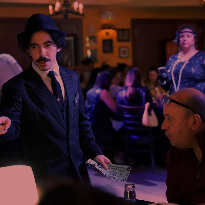 A detective questioning a guest at a Dallas show