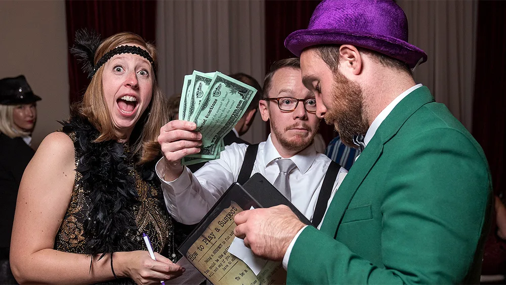 Guests enjoying a Dallas murder mystery party